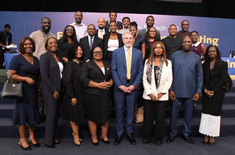 Madam Victoria Bright Chairperson of MMF in a group picture with some MTN Executives and Financial Advisors